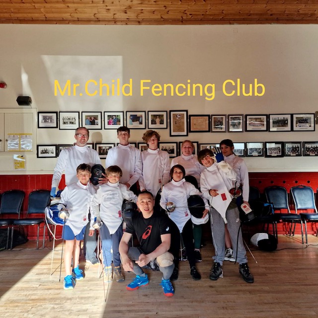 Junior fencers learning basics
