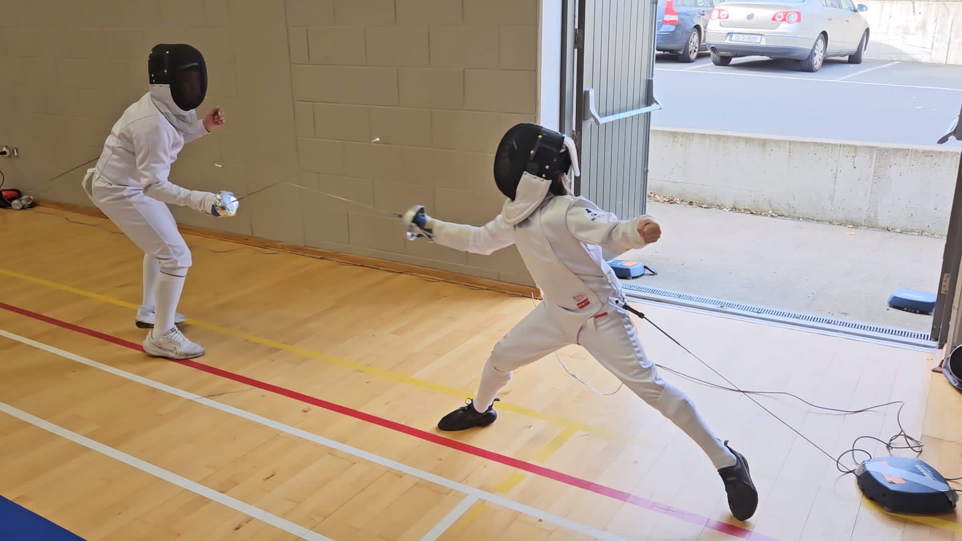 Fencing match in progress